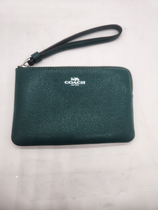 Coach Handbags - Coach Corner Zip Wristlet crafted from crossgrain leather